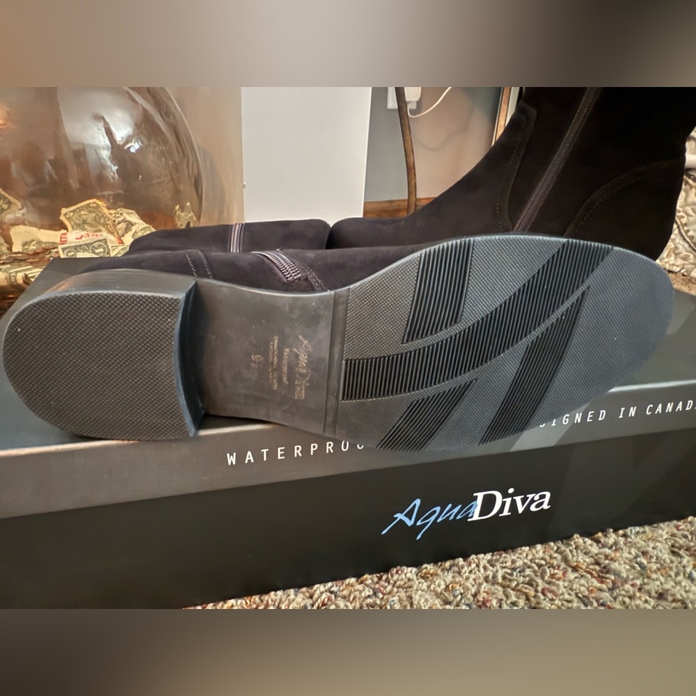 New in box, Aqua Diva tall black suede boots size 9.5
I also have them in a 10 - Picture 5 of 16